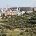E sullo sfondo ecco i palazzi del quartiere San Paolo, alcuni dei quali costruiti proprio a ridosso del Tiflis